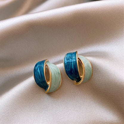 Eleganter Ohrhänger im Meereswirbel-Design